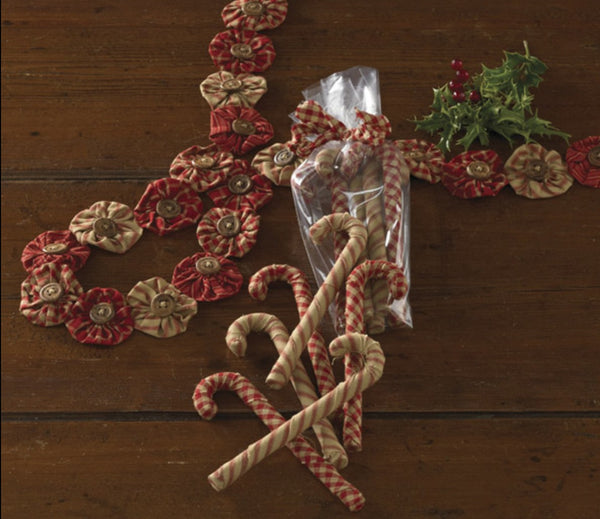 Add vintage charm to your Christmas decor with these beautiful homespun style fabric candy cane fills. This handcrafted set can be added to a Christmas tree or placed in a decorative bowl to bring a little happy nostalgia to the festive season and will blend seamlessly with many home styles. 