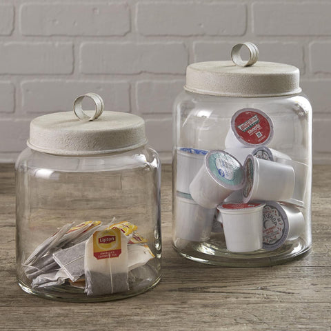 These cute Glass Jars With Metal Lids by Park Designs include one small jar and one large! Both come with rubber seals for freshness!  Dimensions: Large 8.5" H x 6" Diameter; Small 7.25" H x 5.75" Diameter