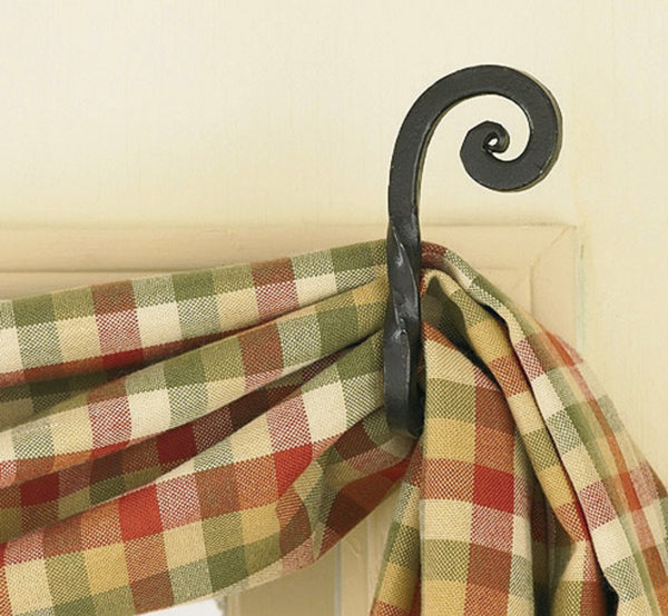 The Forged Scroll Curtain Hooks are perfect for our fishtail swags and many other window dressings. These hooks are finished iron with a scroll design.