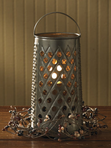 The Cheese Grater Lamp is a reproduction of a vintage grater.