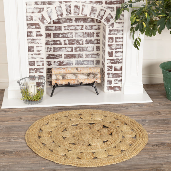 Celeste Jute Rug 3ft Round Features alternating rows of solid braids and small jute circles for a natural, rustic look that complements a wide array of farmhouse decor with rich texture and classic country charm.