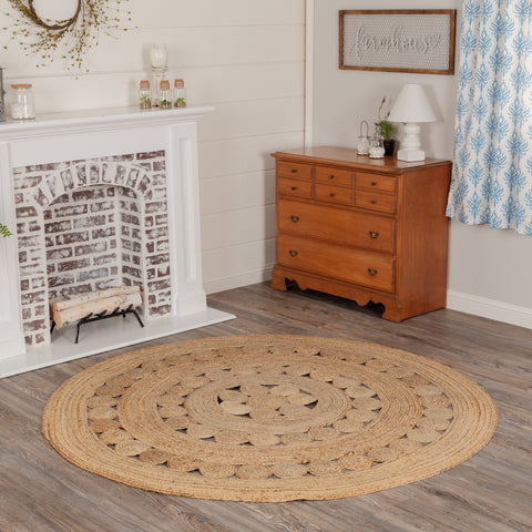 Celeste Jute Rug 6ft Round Features alternating rows of solid braids and small jute circles for a natural, rustic look that complements a wide array of farmhouse decor with rich texture and classic country charm.