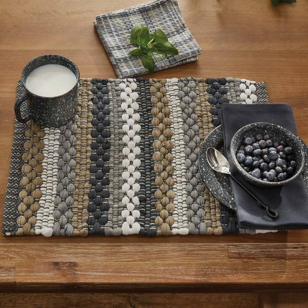 Create a warm and inviting table with the Hartwick Chindi Placemats. The colors of gunmetal, dove gray, tan and candlelight white make for a stylish farmhouse look and gives your table top a great textured look!