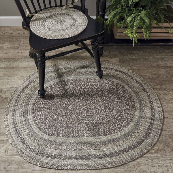 Hartwick Braided Oval Rug - 32" x 42"  Braided Ovalrug can be used in multiple locations to accentuate an area. A non-skid liner is recommended for use under the rug to prevent slipping and damage. Colors: Steel Grey, Taupe & Cream