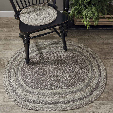 Hartwick Braided Oval Rug - 32" x 42"  Braided Ovalrug can be used in multiple locations to accentuate an area. A non-skid liner is recommended for use under the rug to prevent slipping and damage. Colors: Steel Grey, Taupe & Cream