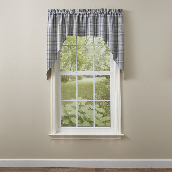 Create a warm and inviting look to your room with the Hartwick Swags. The colors of gunmetal, dove gray, tan and candlelight white make for stylish farmhouse charm!