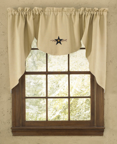 The Star Vine Lined Swag has the look of old mattress ticking in updated country colors. It features a soft, neutral wheat background inlaid with narrow sand stripes, and for added country flair, it offers a sweet black star with berry vine motif! So charming!