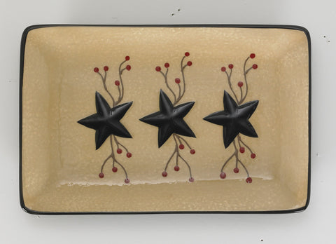 Keep your counter or stove top clean with the Star Vine Spoon Rest! It is hand sponge-painted with a crackled wheat background featuring embossed bold black stars with a berry vine motif. The black rim provides the perfect finishing touch! Pretty and functional!
