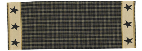 Our primitive Sturbridge Star Table Runner features a black homespun plaid pattern embellished with appliqued black stars for that classic country look! Enhance your dining experience with this runner! 