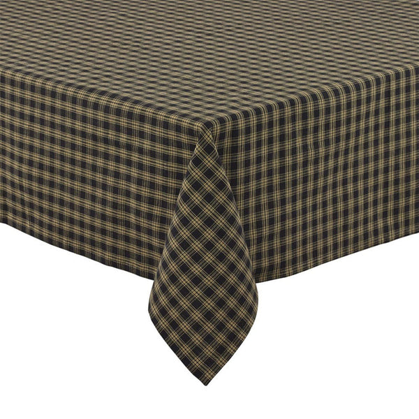The Sturbridge Black Tablecloth offers a pretty, simple homespun plaid of farmhouse tan & black. The perfect table covering for everyday use or for setting a more formal table, this versatile table cloth fits your country home decor needs perfectly! 