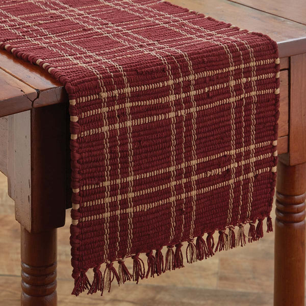 The beautiful wine and tan colors of the Sturbridge Wine Chindi Table Runners will give your table top that country appeal you are looking for! Add the matching placemats (sold separately) for a complete look.   Colors: Wine & Farmhouse Tan