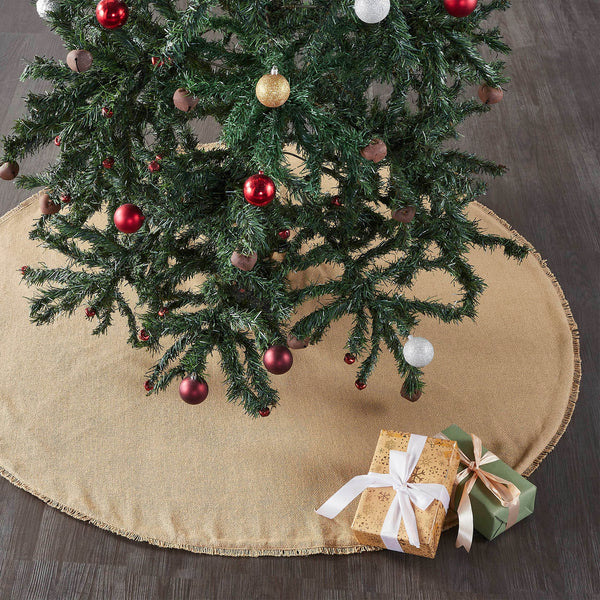 Yuletide Burlap Tan Tree Skirt 48 Add rustic style to your Christmas traditions with the Yuletide Burlap Tan Tree Skirt. The round tree skirt features a 48 inch diameter. A warm tan base constructed with a soft cotton burlap will add simple, sophisticated style for a perfect farmhouse Christmas look. 