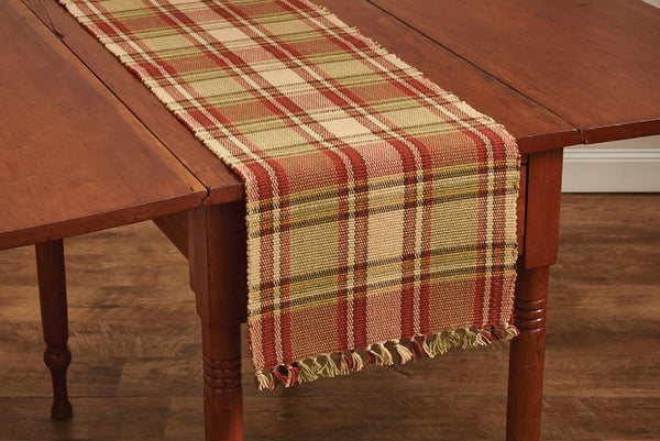 Enhance your kitchen decor with these Heartfelt Table Runners! A rich blend of thyme green, red, buttercream & tones of brown work perfectly together to create a lovely country plaid that adds ambiance to your home! The fringed ends provide the perfect country appeal! 