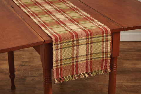 Enhance your kitchen decor with these Heartfelt Table Runners! A rich blend of thyme green, red, buttercream & tones of brown work perfectly together to create a lovely country plaid that adds ambiance to your home! The fringed ends provide the perfect country appeal! 