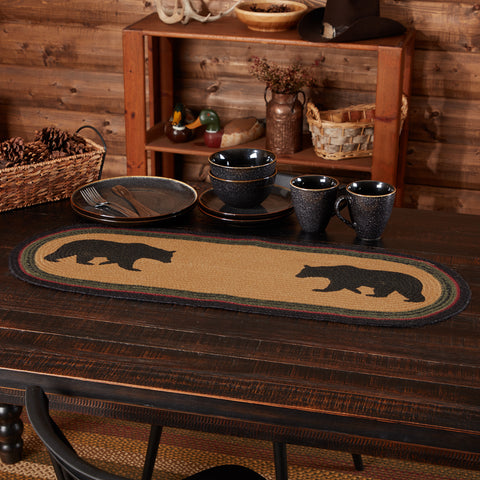 Wyatt Stenciled Bear Jute Runner Oval 13x36, , two bears are stenciled into the jute over solid dark tan. Concentric braids of black, crimson, and army green jute dominate this gorgeous runner. Primitive Country Farmhouse Kitchen Table Dining Home Decor.