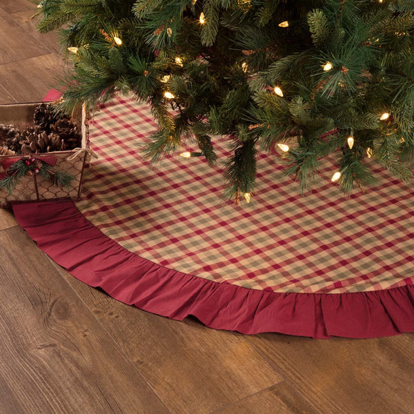 Jonathan Plaid Tree Skirt 48 features Traditional deep red, olive green, and tan plaid fabric. Primitive Country Farmhouse Christmas Holiday Home Decor.