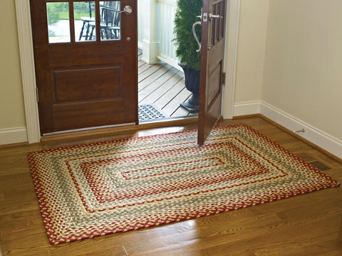 Folk Art Braided Rectangular Rug 48" x 72"  This accent rug measures 48" x 72" and is perfect for adding a pop of color in any room in the home. Colors: Buttercream, Avocado, Garnet & Cream