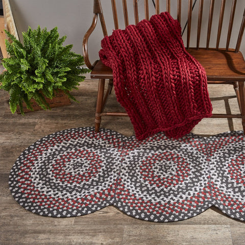 Limestone Scalloped Cotton Braided Rug Runner 30" x 72"  This accent rug measures 30" x 72" and is perfect for adding a pop of color in any room in the home Colors: Whisper Greige, Candlelight White, Black & Christmas Red