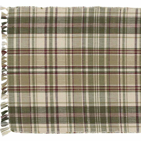 This Thyme Table Runner is a beautiful addition to any decor! It offers soft tones of green, red & tan that blend perfectly together to create a pretty plaid that oozes warm, country ambiance in your dining area