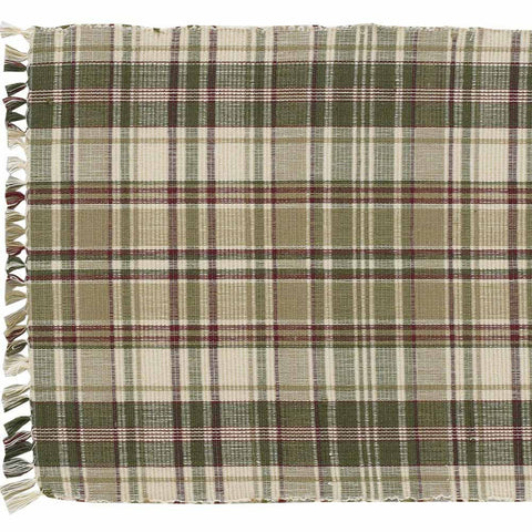 This Thyme Table Runner is a beautiful addition to any decor! It offers soft tones of green, red & tan that blend perfectly together to create a pretty plaid that oozes warm, country ambiance in your dining area