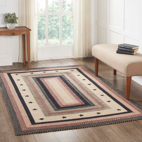 Colonial Star Jute Rug Rect w/ Pad 60x96, with woven braids of Natural, Country Black, Bright Red with applique black stars. Visit website for FREE s/h & discount offers. Primitive Country Farmhouse Home Decor.