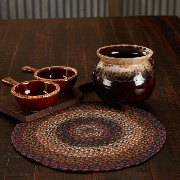 Beckham Jute Round Trivet. This 15 inch rustic table trivet is the perfect feature to stop heat from hot pots and pans from destroying a valued table or countertop. In braided fabrics of Brick Red, Country Black, Dark Tan. Visit website for FREE s/h & discount offers.