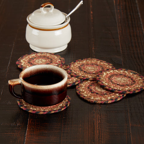 Ginger Spice Jute Round Coasters set of 6 farmhouse coasters with the woven braided jute wool blend fabrics in terracotta, burgundy, dark tan, and antique white displayed in concentric circles. Visit website for FREE s/h & discount offers. Primitive Country Farmhouse Home Decor.