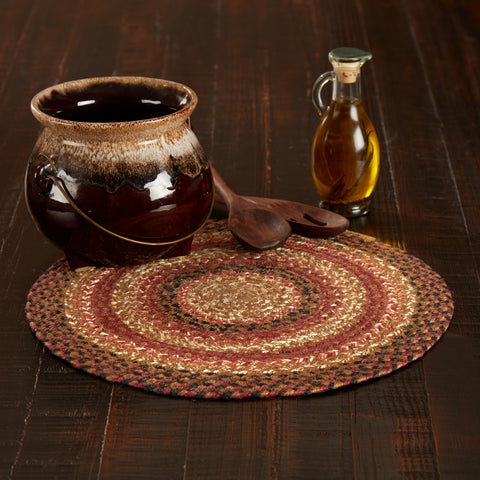 Ginger Spice Jute Trivet 15, with the woven braided jute wool blend fabrics in terracotta, burgundy, dark tan, and antique white displayed in concentric circles. Visit website for FREE s/h & discount offers. Primitive Country Farmhouse Home Decor.