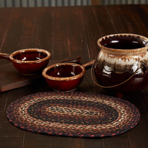 Beckham Jute Oval Placemat 10x15, this rustic placemat is the perfect feature for your kitchen or dining room table, fabrics in brick red, dark tan, and country black and white displayed in concentric ovals. Visit website for FREE s/h & discount offers.