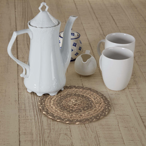 Cobblestone Jute Trivet 8  https://allysonsplace.com/products/cobblestone-jute-trivet-8  Cobblestone Jute Trivet 8 inch. Features woven braided jute wool blend fabrics in khaki, grey taupe, and creme displayed in concentric circles. Visit website for FREE s/h & discount offers.