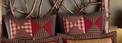 Cabin Patchwork Quilted Euro Sham features patchwork tan, red, green, and blue. Log Cain Rustic Lodge Mountain Bedding Home Decor.