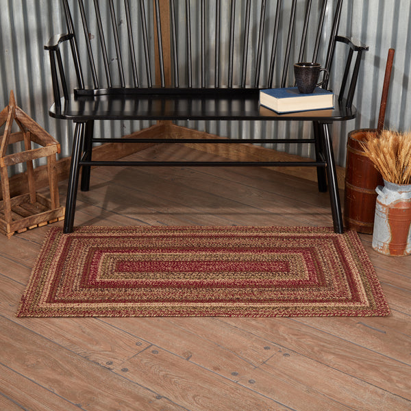Cider Mill Jute Rug makes a textured primitive addition to your home decor. This 27"x48" rug showcases beautiful concentric braids of natural tan, burgundy, and olive green. Visit website for FREE s/h & discount offers.