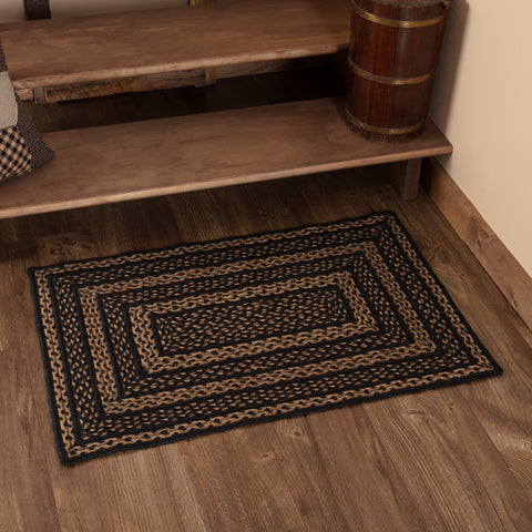 The rectangle 24x36 Farmhouse Jute Rug is ready for your home, retreat or cabin with its durable and beautiful construction. Featuring alternating braids in black and tan for years of enjoyment. Primitive Country Farmhouse Home Decor Ebony.