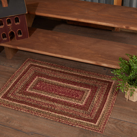 Cider Mill 20"x30" Jute Rug Rectangle. Featuring concentric, mixed braids of burgundy, tan, and olive green for a classic country, primitive look. Visit website for FREE s/h & discount offers.