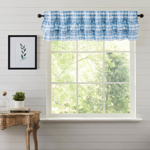 Our Annie Buffalo Blue Check Ruffled Valance Curtain 16x72 features classic buffalo check in calming colors of dusk blue and soft white, gracefully trimmed with ruffles. Visit website for FREE s/h & discount offers.