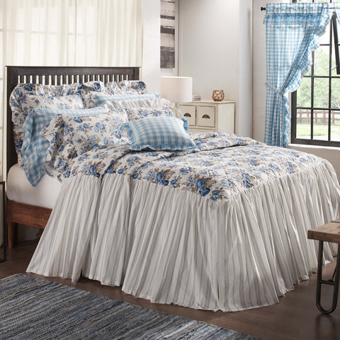 Annie Blue Floral Ruffled King Coverlet 80x76 with a 27" drop enhances decor with elegant florals and classic stripes of dusk blue, soft white, and portabella cozy cottage feel, finished with extra fabric around the entire quilt for a graceful look that covers your bedframe. Visit website for FREE s/h & discount offers.