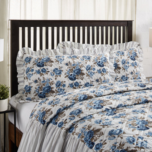 Annie Blue Floral Ruffled King Sham 21x37. Beautifully showcasing unique floral print in dusk blue, soft white, and portabella brown finished with a graceful stripe pattern ruffled edge that updates your home decor with a lighthearted country feel. Visit website for FREE s/h & discount offers.
