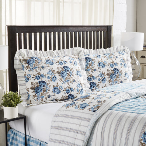 Dress your bed in cozy comfort and vintage charm with the Annie Blue Floral Ruffled Standard Sham 21x27. Beautifully showcasing unique floral print in dusk blue, soft white, and portabella brown finished with a graceful stripe pattern ruffled edge. Visit website for FREE s/h & discount offers.