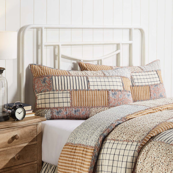 Adorn your vintage farmhouse bedroom with unique patterns and heirloom quality. The Kaila King Sham 21x37 mirrors our Kaila Quilt perfectly, showcasing delicate floral prints, classic stripes, and windowpane patterns in navy, gold, and dusty rose. Visit website for FREE s/h & discount offers.