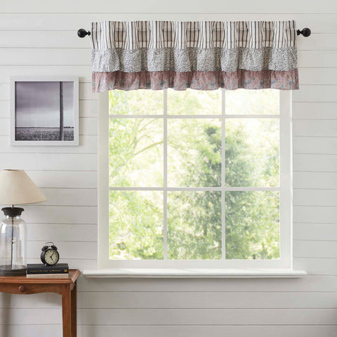 Kaila Blue Ruffled Valance 16x72. This navy and creme stripe curtain is beautifully decorated with graceful floral print ruffles towards the top that add rustic romance and heartwarming, cozy cottage vibes. Visit website for FREE s/h & discount offers.