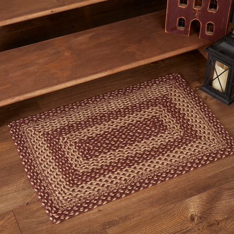 Burgundy Tan Primitive Jute Rug warms a space with natural texture and traditional design. The alternating braids of burgundy and tan delight the eyes and add a decorative touch for primitive, traditional country, and Americana looks. Visit website for FREE s/h & discount offers.