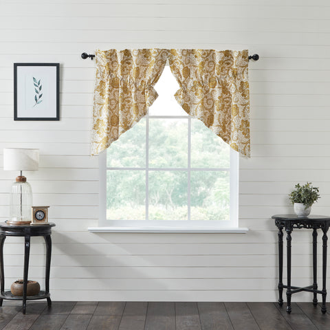 Dorset Gold Floral Prairie Swag Set adds charming, country style to your home. Prairie curtains are a classic country style featuring long, angled drapes to frame your window while leaving a triangular space open for additional natural light