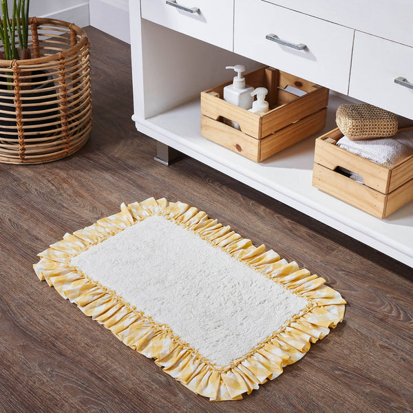 Annie Yellow Shower, Bathmats The Annie Buffalo Check Yellow Bath Mat 20x30 features a solid white core in premium, ultra absorbent cotton. It is trimmed with a ruffled checked fabric in bold yellow and white.