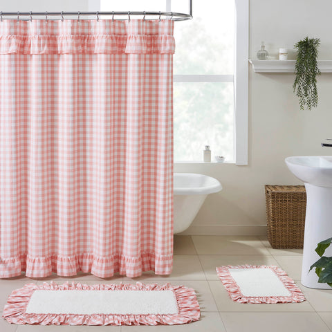Annie Coral ShowerDecorate your bathroom with the perfect blend of simplicity and country charm with the Annie Buffalo Coral Check Ruffled Check Shower Curtain. Featuring large scale coral and white checks beautifully accented with ruffles, our 72x72 fabric shower curtain provides a vintage, farmhouse touch to your decor. This machine washable, 100% cotton shower curtain includes button holes for shower hooks and a rod pocket for versatility and convenience.