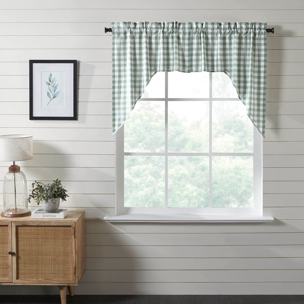 Annie Green Window, Swag, Swags The Annie Buffalo Green Check Swag Set of 2 36x36x16 adds charming, country cottage style to your home. Swag curtains are a classic country style featuring angled drapes to frame your window while leaving space open for additional natural light. 