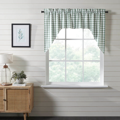 Annie Green Window, Swag, Swags The Annie Buffalo Green Check Swag Set of 2 36x36x16 adds charming, country cottage style to your home. Swag curtains are a classic country style featuring angled drapes to frame your window while leaving space open for additional natural light. 