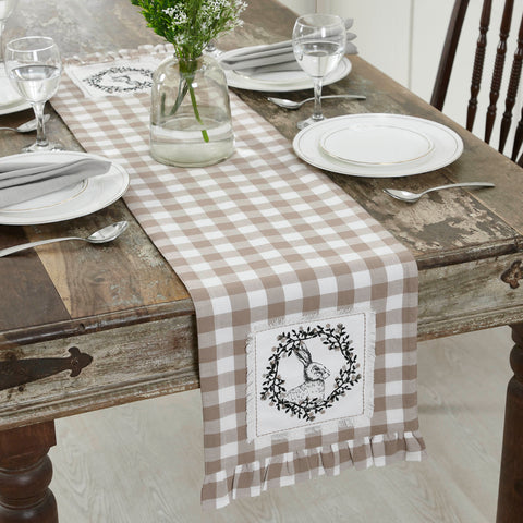 Annie Portabella Table, Runners, Easter Décor, Spring Add warm vintage style to your spring decor with portabella buffalo check plaid and a charming rabbit and wreath design. The Annie Buffalo Portabella Check Vintage Hare Table Runner measures 12x48 inches to add Spring style to your small accent or coffee tables.
