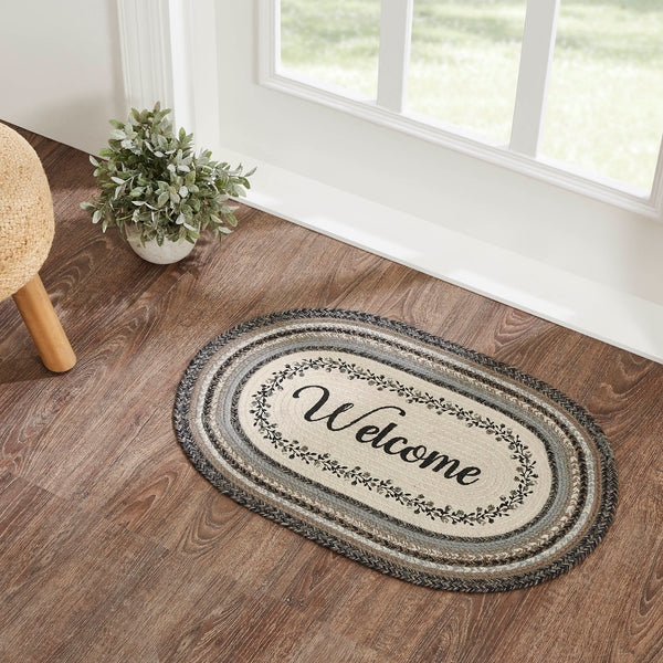 Floral Vine Rugs, 20 x 30 in. Rugs Features a blend of black, grey, and cream with a vine and floral design looping around the word, welcome for a soft, shabby chic look that complements a wide array of country farmhouse decor.