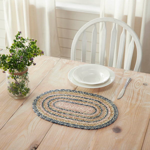 Kaila Jute Table,  The rich texture of braided jute is given a modern twist with soft blue, golden tan and misty rose tones for a casual country boho style. 