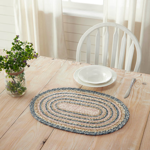 Kaila Jute Table,  The rich texture of braided jute is given a modern twist with soft blue, golden tan and misty rose tones for a casual country boho style. 